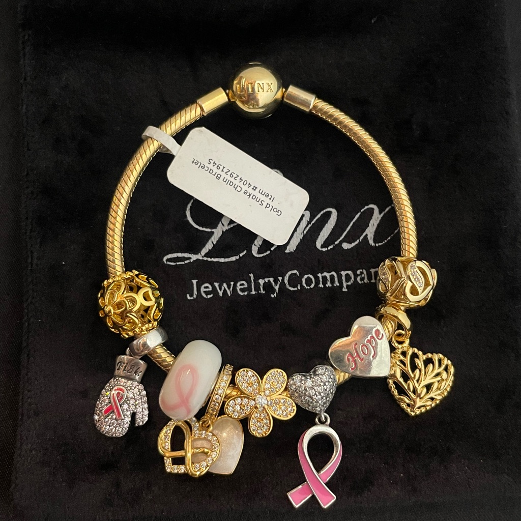 Linx Yellow Gold Bracelet With Pink Breast Cancer Awareness Themed Charms